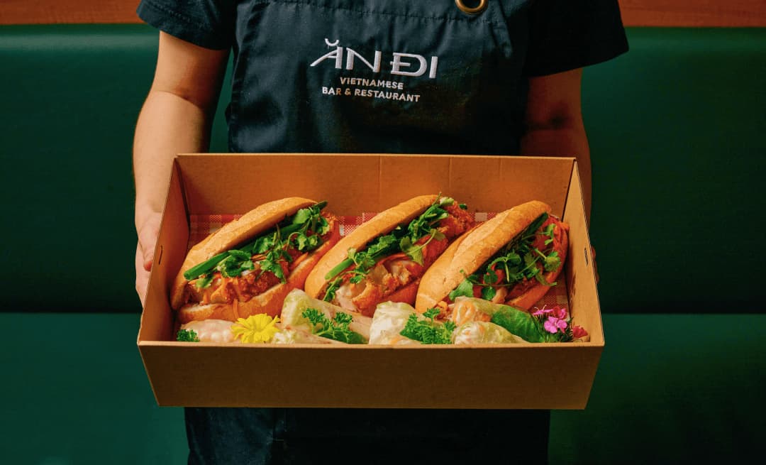 Tray of Vietnamese bánh mì catering boxes for a Melbourne office event