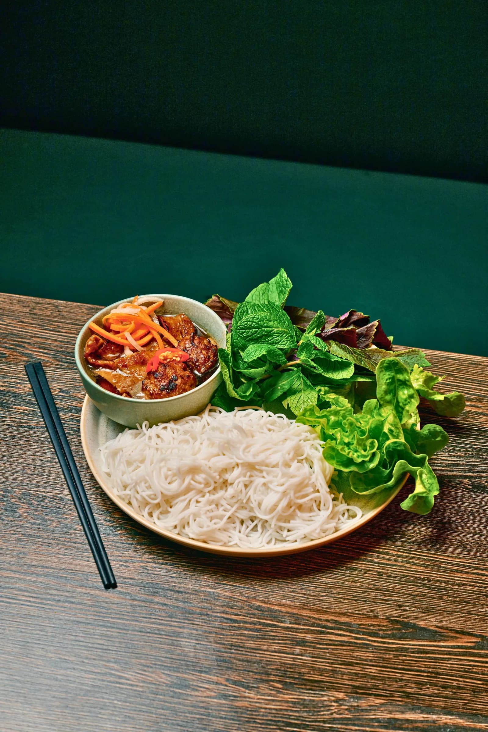 Bún chả Hà Nội, charcoal grilled pork in dipping broth with vermicelli and fresh herbs